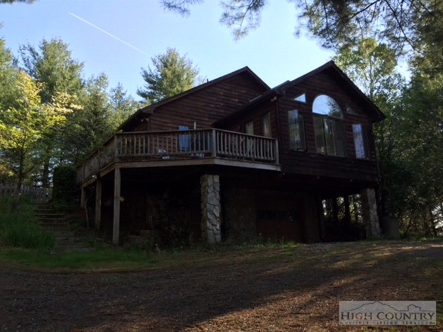 286 A Howell Road Lansing, NC 28643 - Photo 1 of 1 a view of a big house with a yard