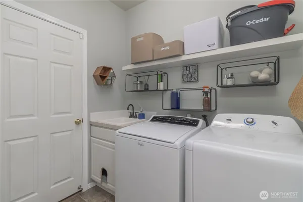 a utility room with dryer and washer