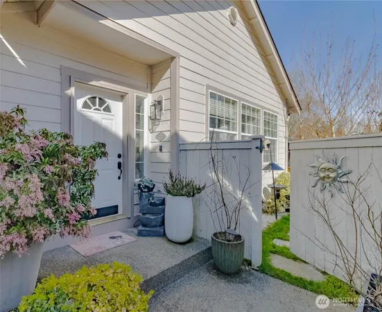 a view of a patio with plants and a potted plant