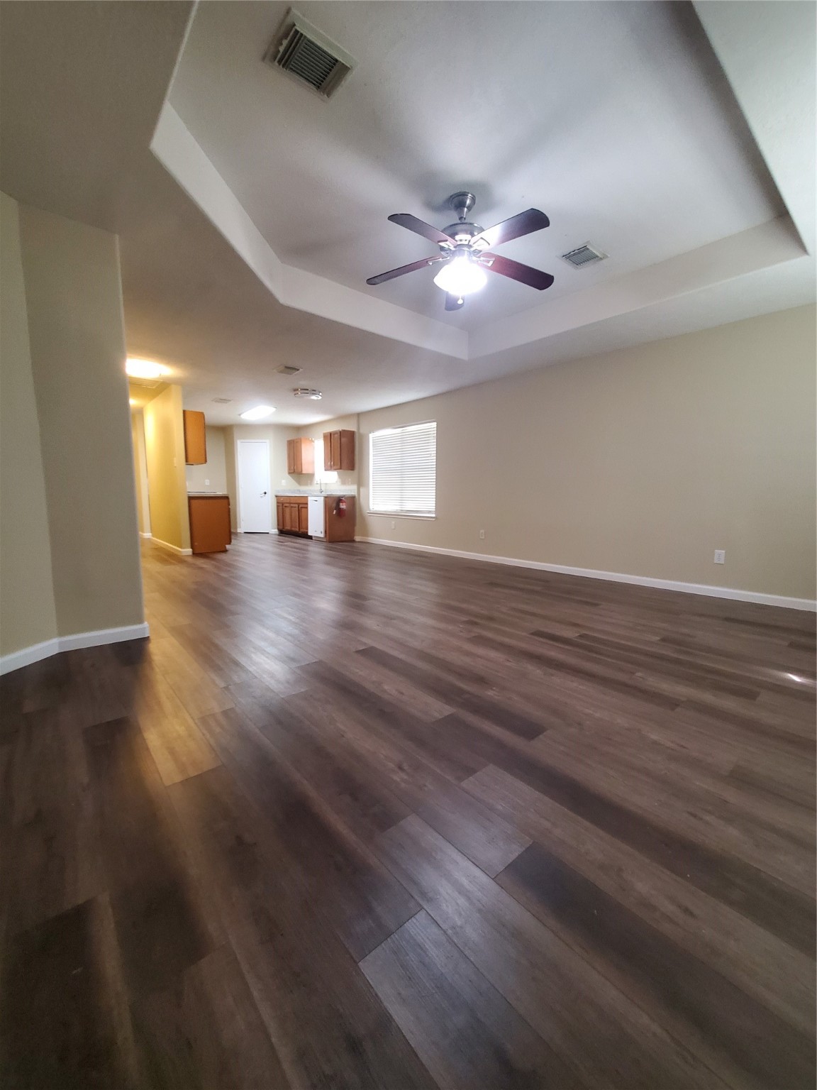 9342 Canady Park Lane Houston, TX 77075 - Photo 11 of 25 wooden floor in an empty room with a window