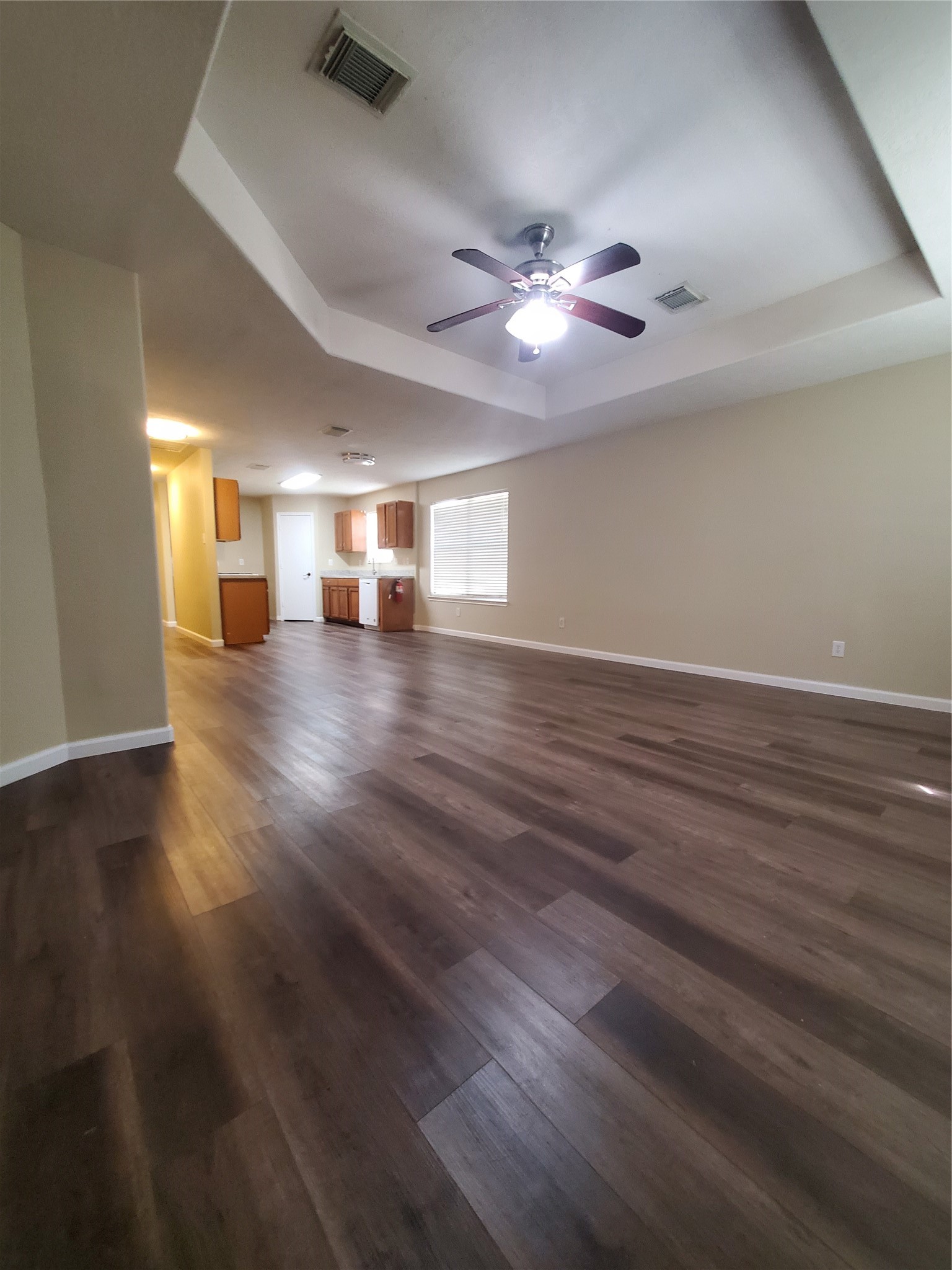 9342 Canady Park Lane Houston, TX 77075 - Photo 11 of 25 wooden floor in an empty room with a window