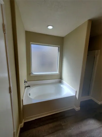a bathroom with a bathtub
