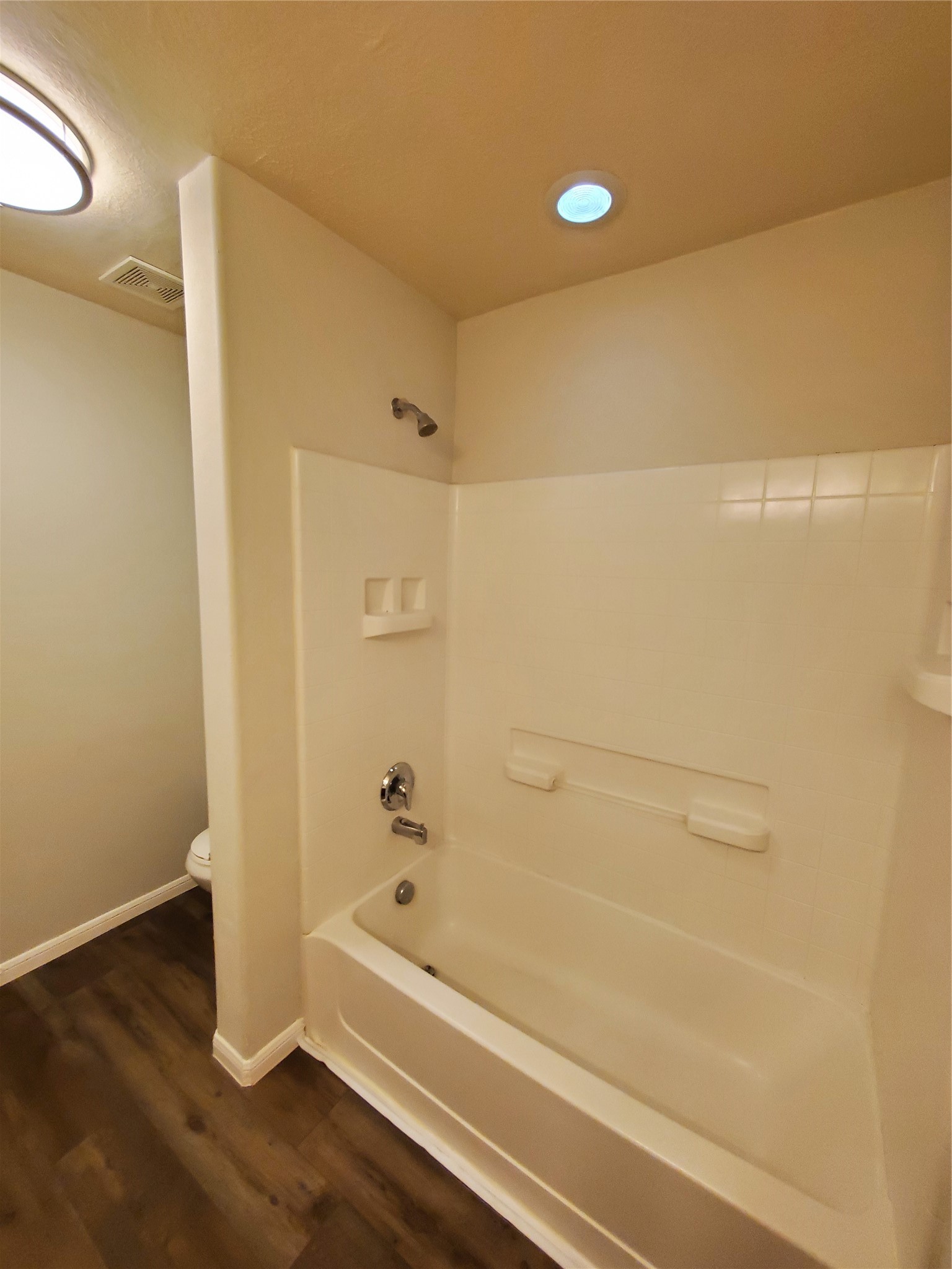 9342 Canady Park Lane Houston, TX 77075 - Photo 22 of 25 a bathroom with a bathtub and a shower