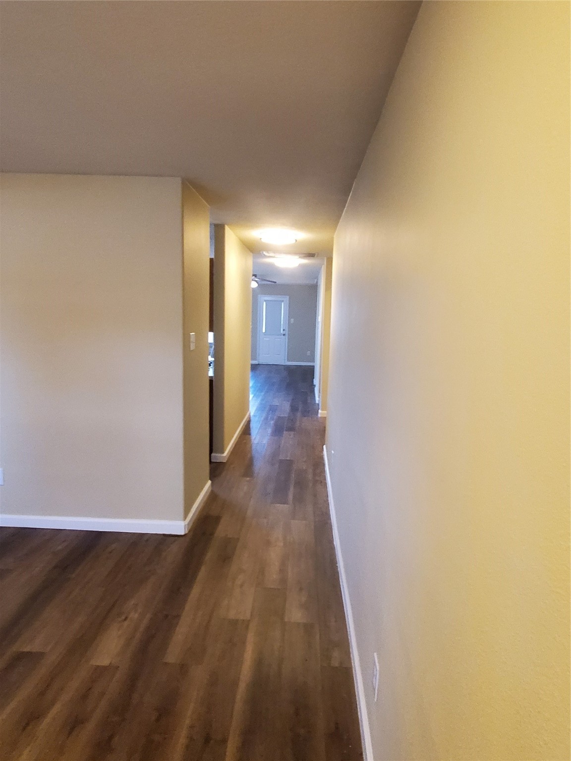 9342 Canady Park Lane Houston, TX 77075 - Photo 4 of 25 a view of a hallway with wooden floor