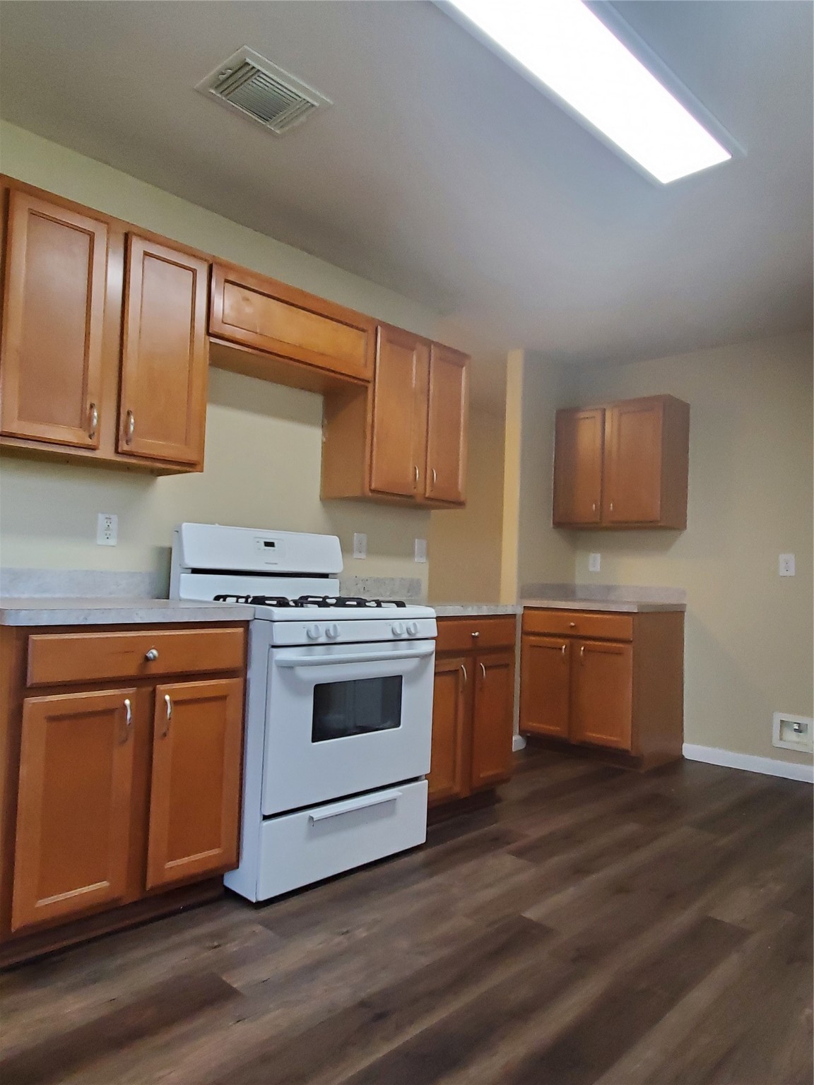 9342 Canady Park Lane Houston, TX 77075 - Photo 6 of 25 a kitchen with stainless steel appliances granite countertop a stove a sink and a refrigerator