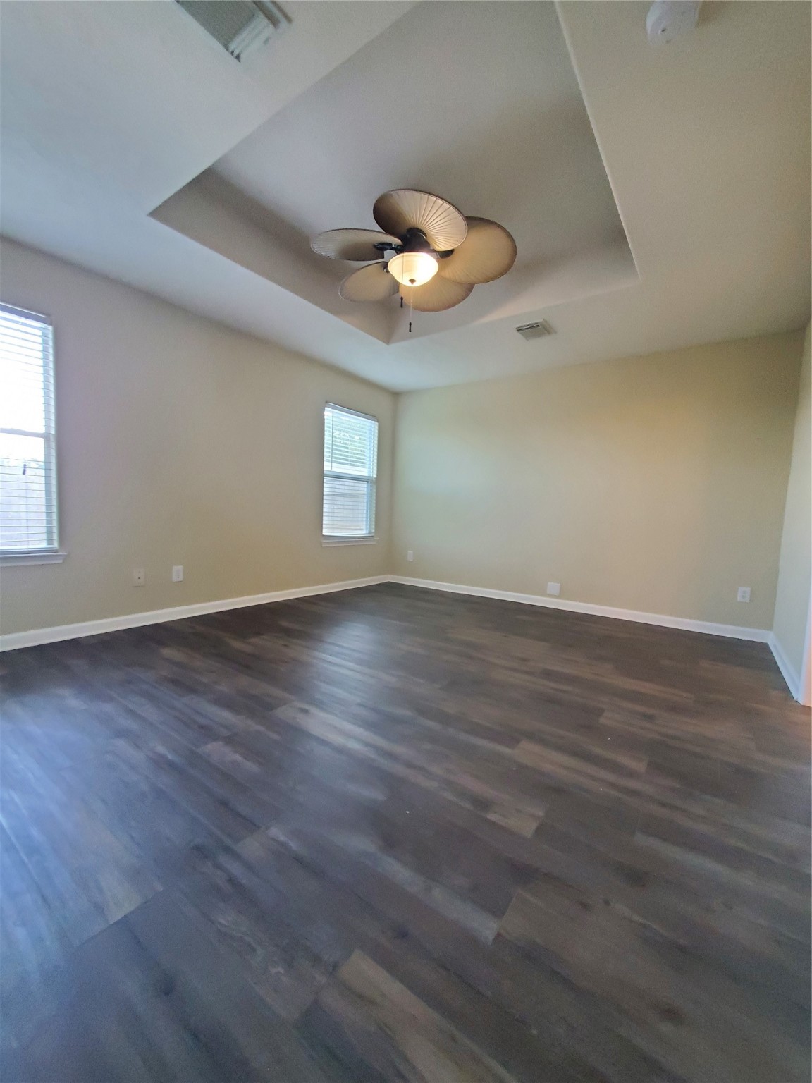 9342 Canady Park Lane Houston, TX 77075 - Photo 10 of 25 wooden floor in an empty room with a window
