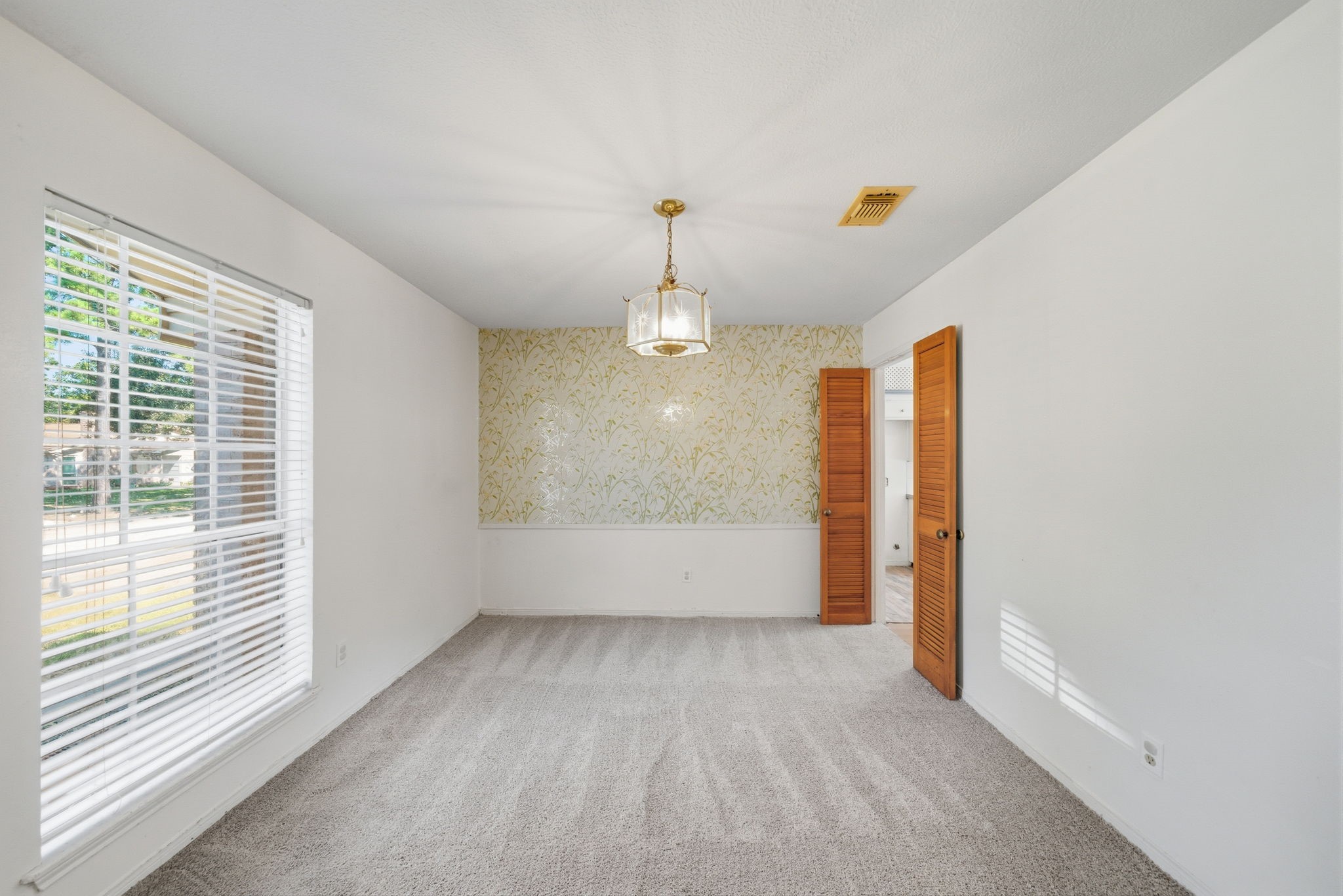6919 River Mill Drive Spring, TX 77379 - Photo 11 of 20 wooden floor in an empty room with a window
