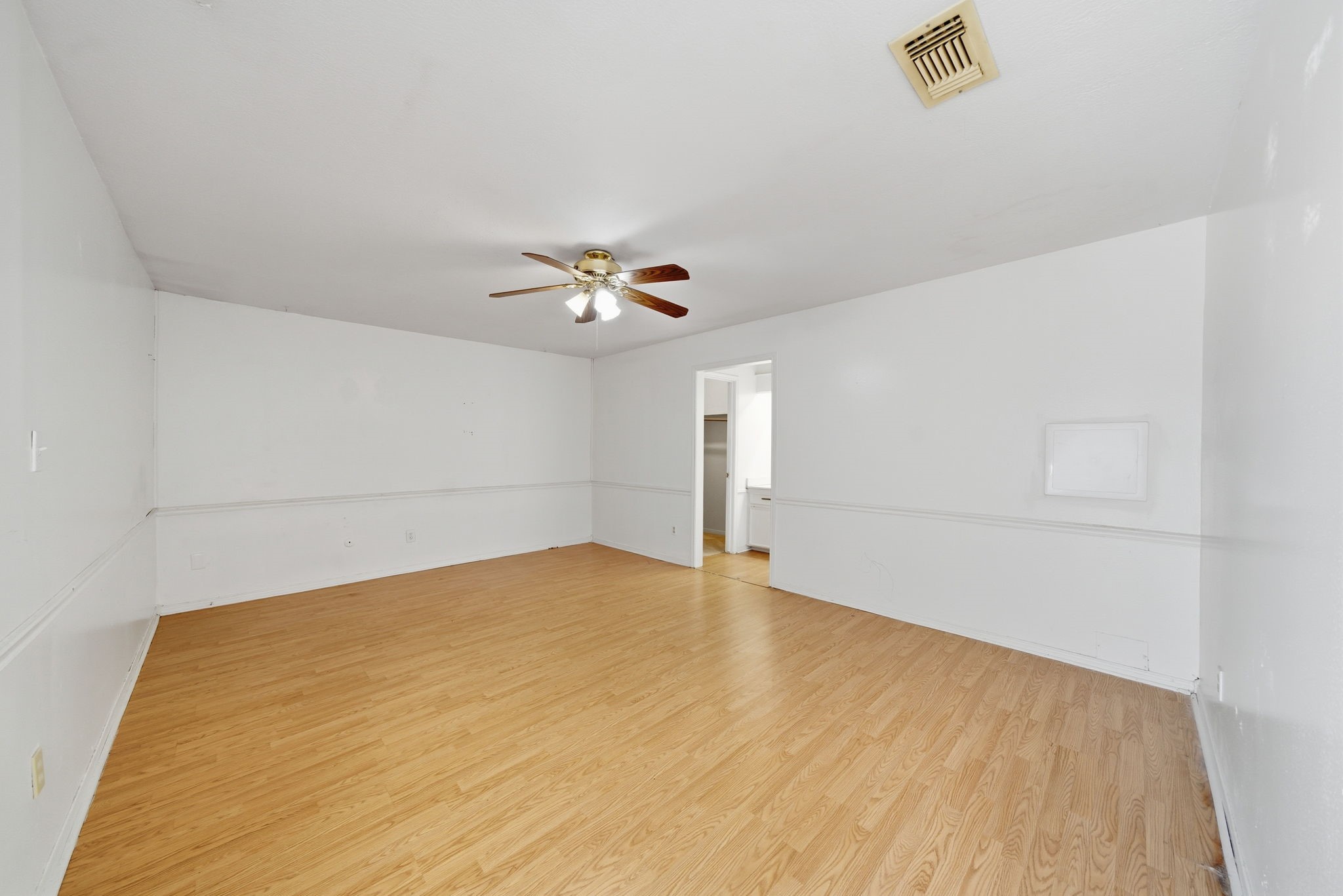 6919 River Mill Drive Spring, TX 77379 - Photo 14 of 20 a view of empty room with wooden floor