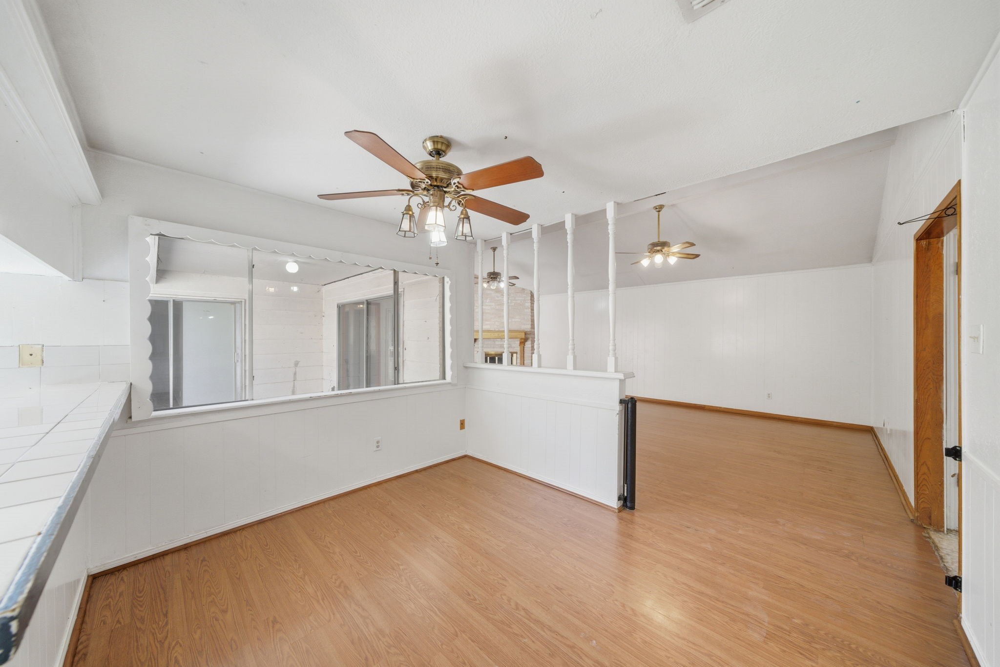 6919 River Mill Drive Spring, TX 77379 - Photo 17 of 20 wooden floor in an empty room with a window