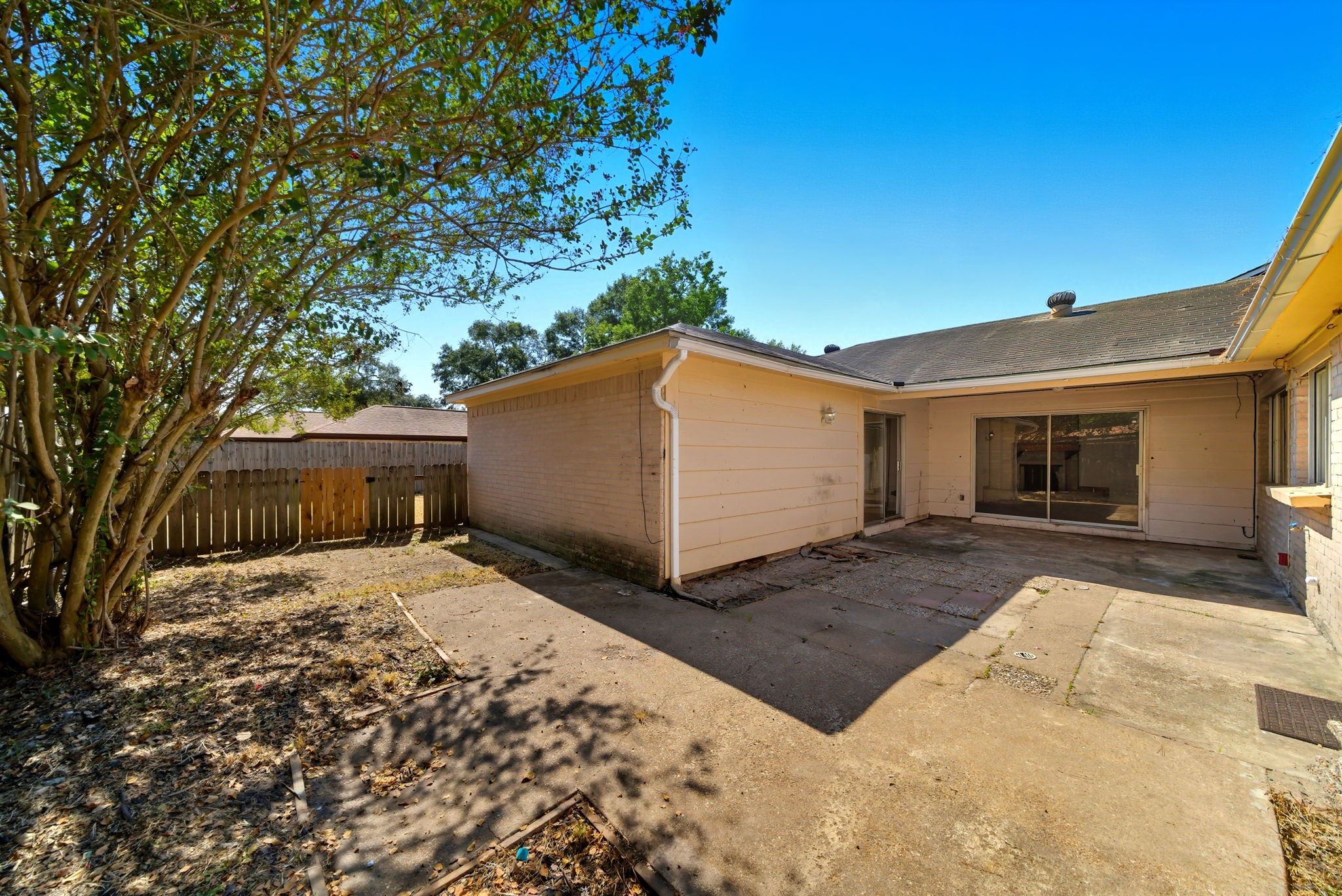 6919 River Mill Drive Spring, TX 77379 - Photo 19 of 20 a view of a house with a yard