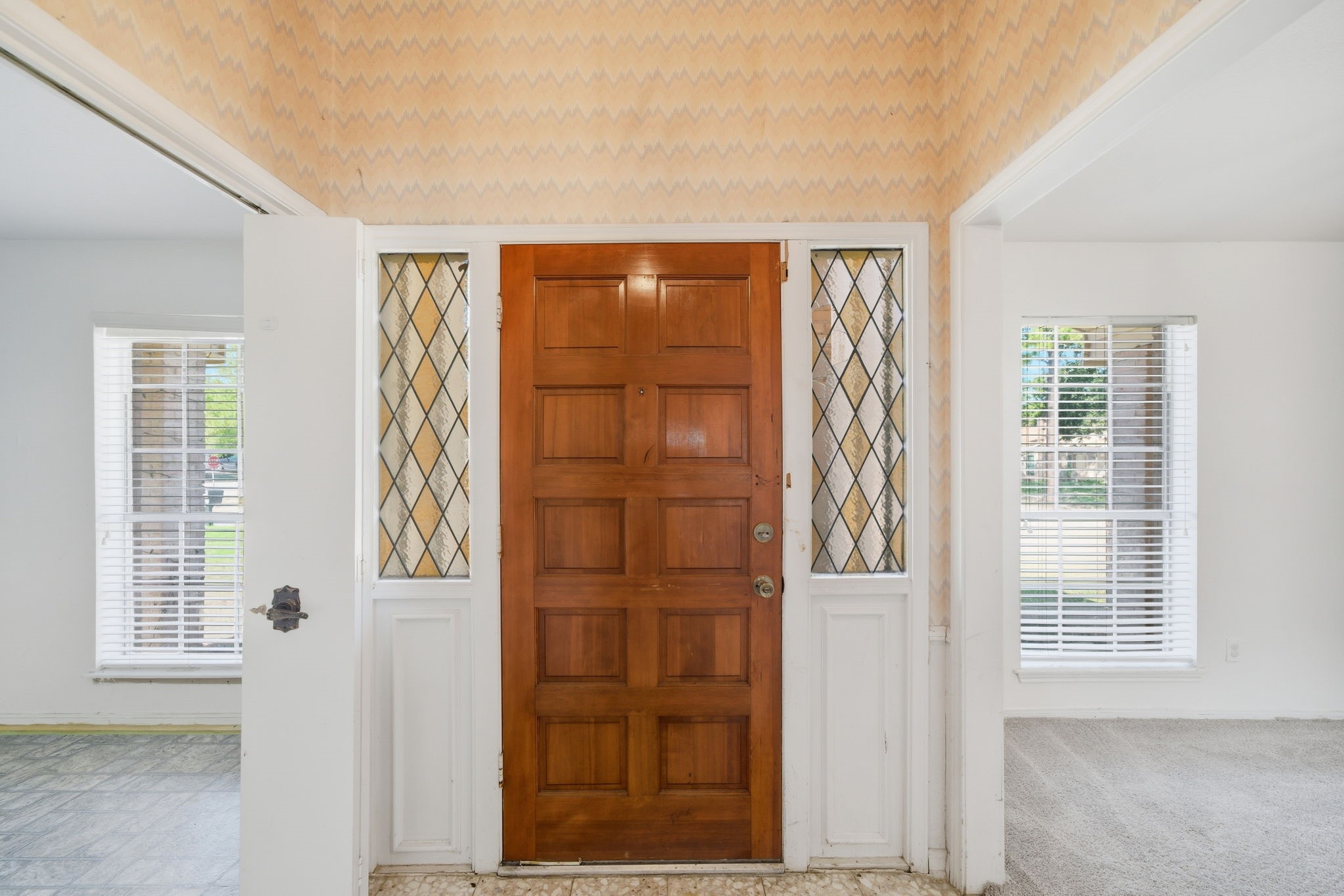 6919 River Mill Drive Spring, TX 77379 - Photo 2 of 20 a view of an empty room with a window