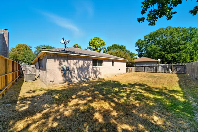 a view of house with outdoor space