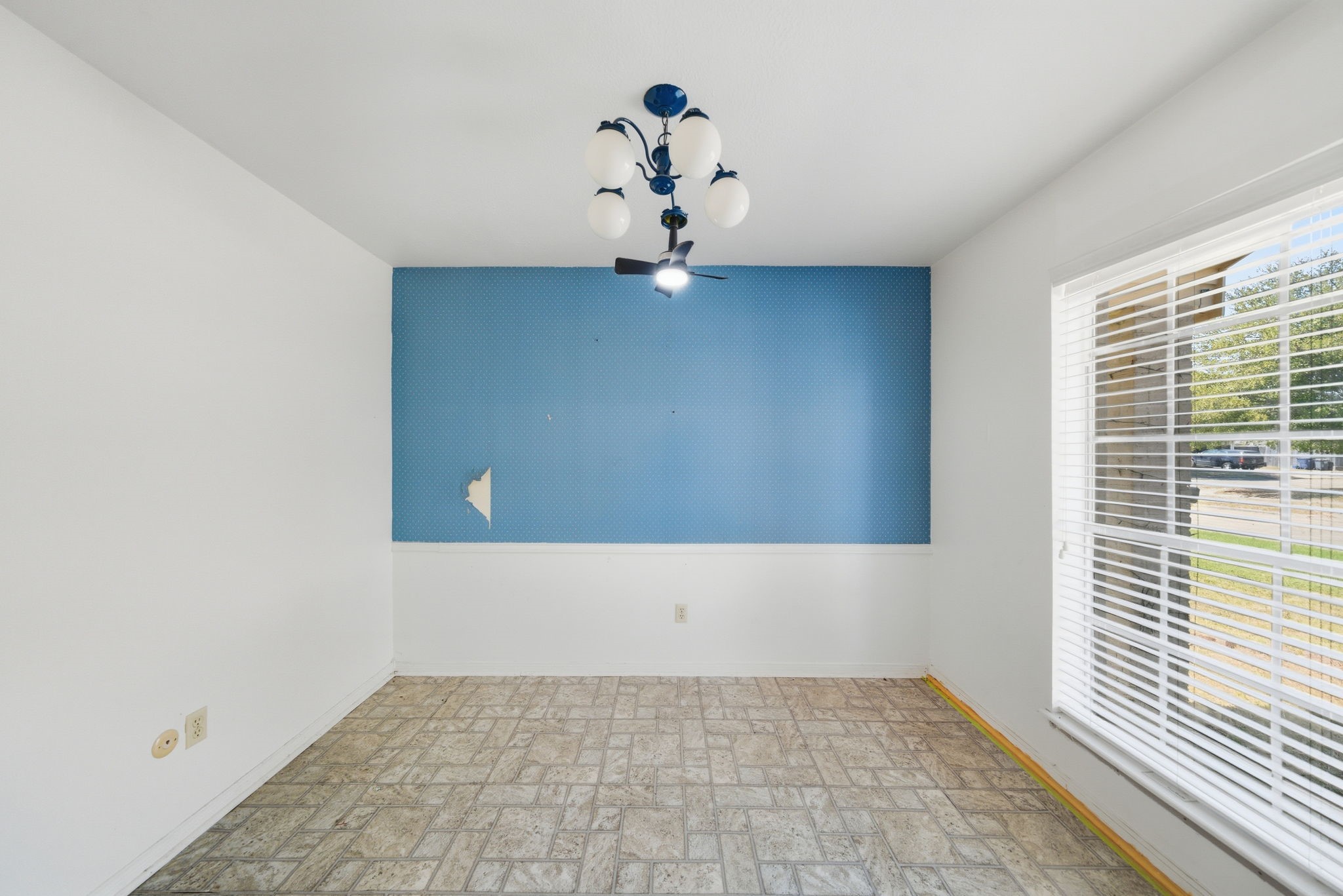 6919 River Mill Drive Spring, TX 77379 - Photo 10 of 20 a view of an empty room with a window
