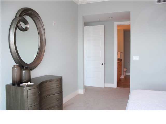 211 Durango Road, Unit 213 Destin, FL 32541 - Photo 14 of 32 a living room with a mirror and a mirror