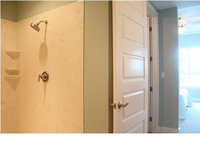 211 Durango Road, Unit 213 Destin, FL 32541 - Photo 16 of 32 a bathroom with a shower and a sink