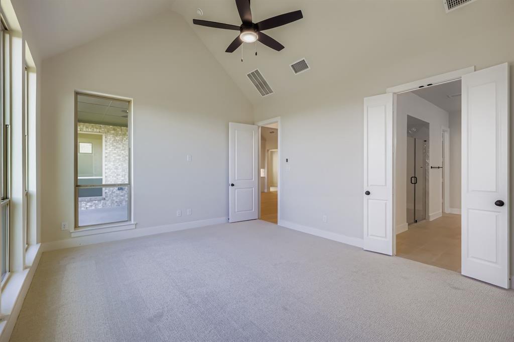 4813 Strada Street Prosper, TX 75078 - Photo 13 of 28 a view of empty room with ceiling fan