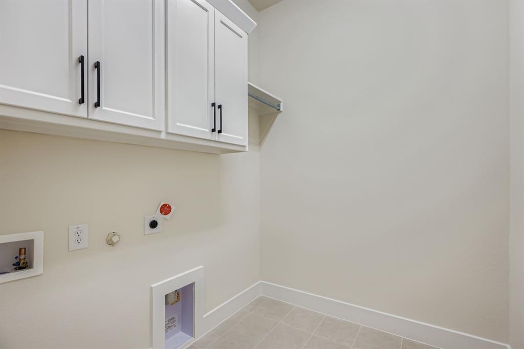 4813 Strada Street Prosper, TX 75078 - Photo 21 of 28 a view of an empty room