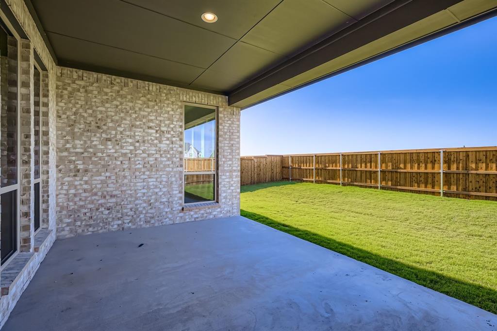 4813 Strada Street Prosper, TX 75078 - Photo 24 of 28 a view of an outdoor space and tv