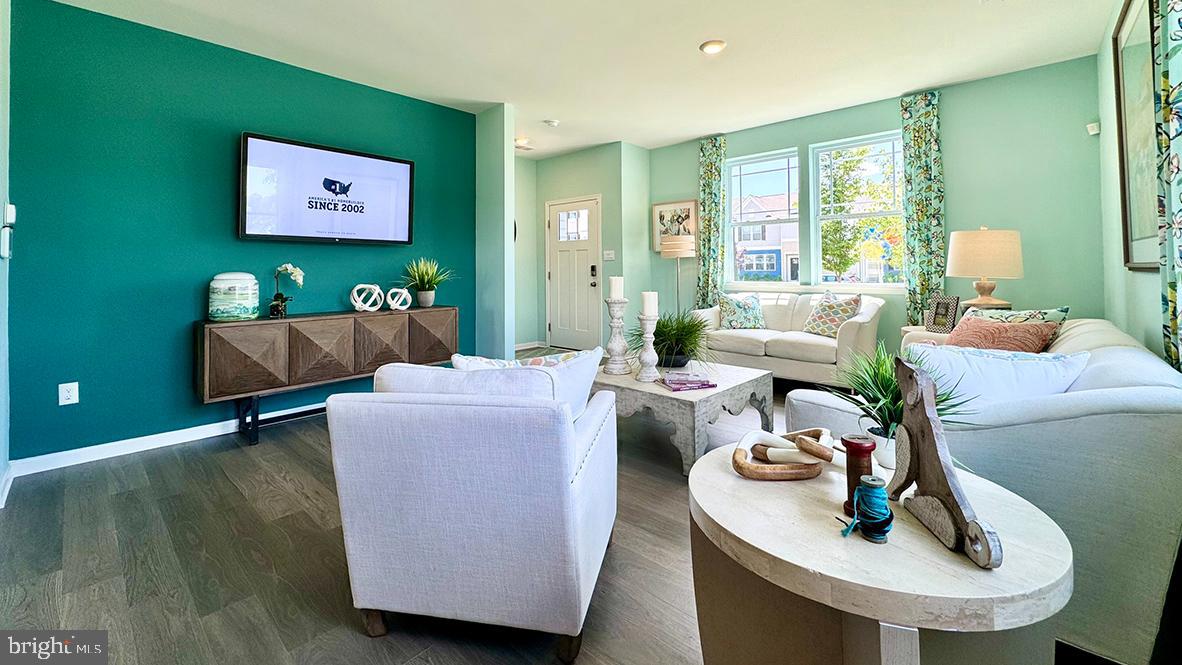 822 Mersey Lane Salisbury, MD 21801 - Photo 15 of 28 a living room with furniture and a couch