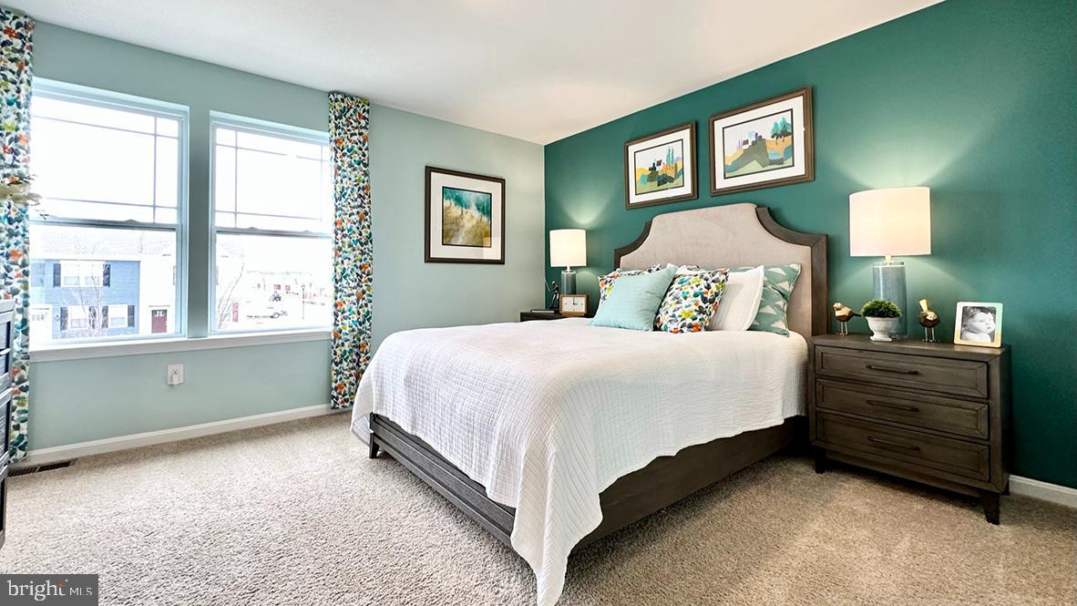 822 Mersey Lane Salisbury, MD 21801 - Photo 24 of 28 a bedroom with a bed and a window