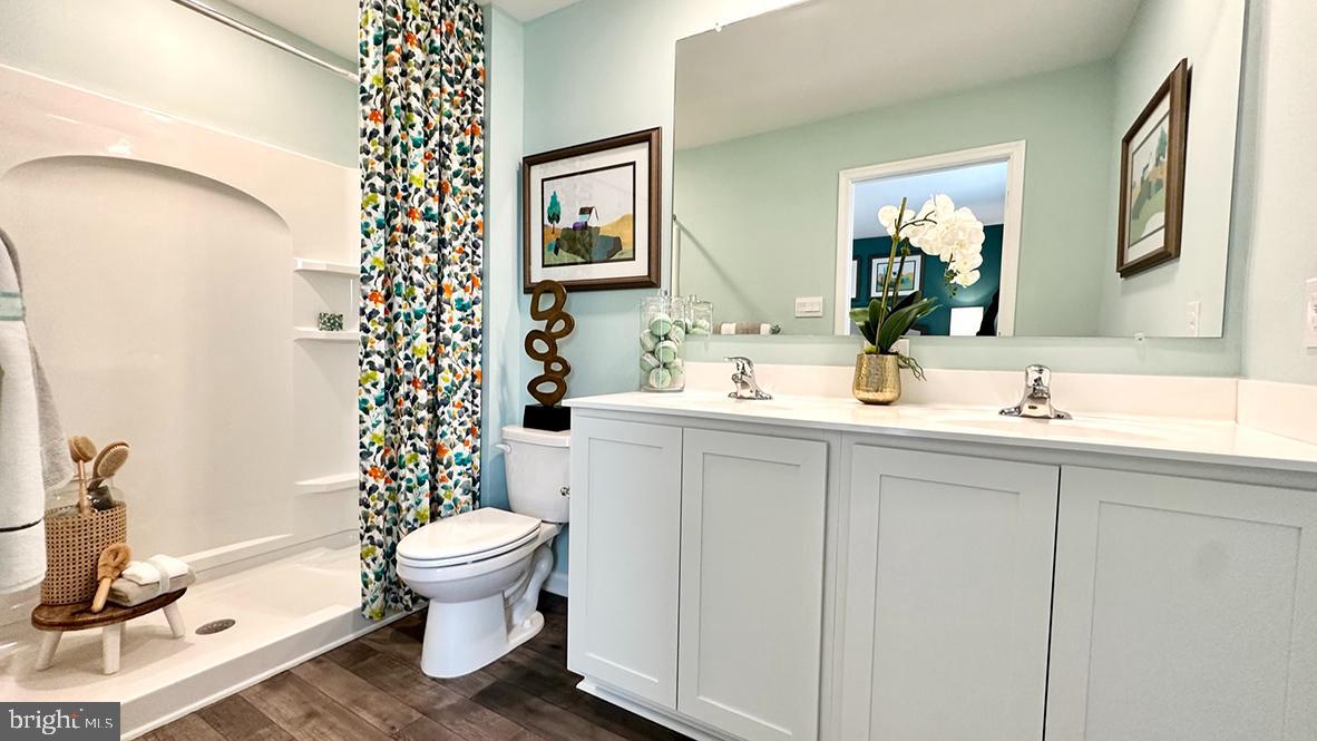 822 Mersey Lane Salisbury, MD 21801 - Photo 26 of 28 a bathroom with a sink toilet and shower