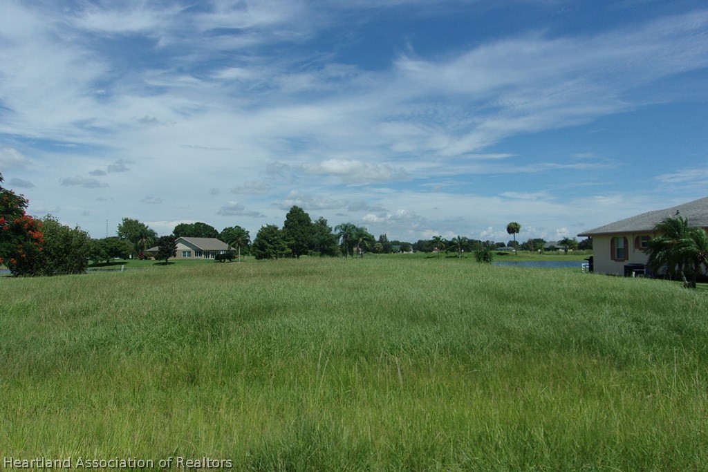 6609 Concord Street Sebring, FL 33876 - Photo 1 of 14 a view of building with outdoor space