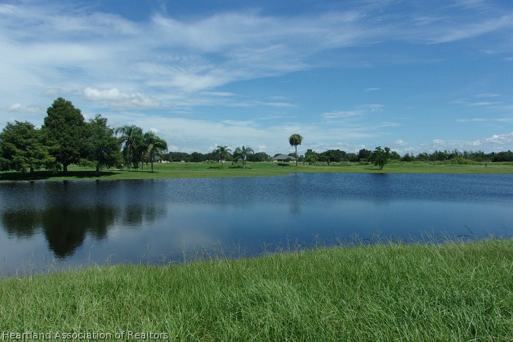 6609 Concord Street Sebring, FL 33876 - Photo 2 of 14 a view of a lake