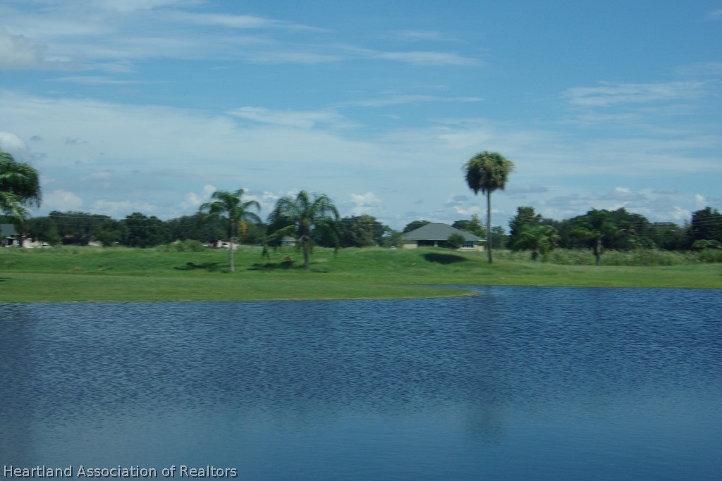 6609 Concord Street Sebring, FL 33876 - Photo 7 of 14 a view of a golf course