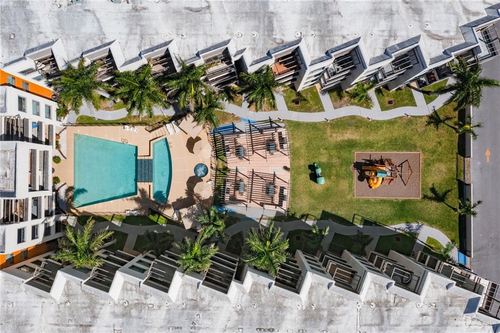 813 Travis Street, Unit 314 Mission, TX 78572 - Photo 23 of 26 an aerial view of a house with a yard