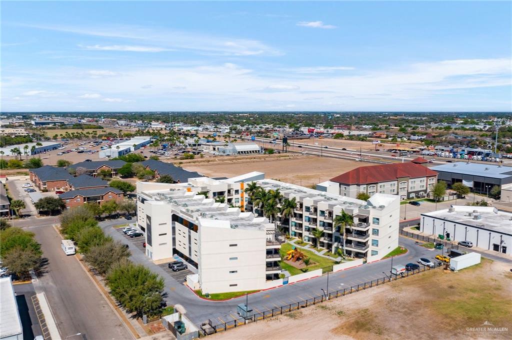 813 Travis Street, Unit 314 Mission, TX 78572 - Photo 24 of 26 an aerial view of residential building with ocean view