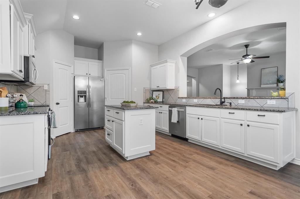 151 Birdsong Lane Terrell, TX 75160 - Photo 12 of 28 Bright and functional offering ample cabinet storage, generous counter space, and an open layout.