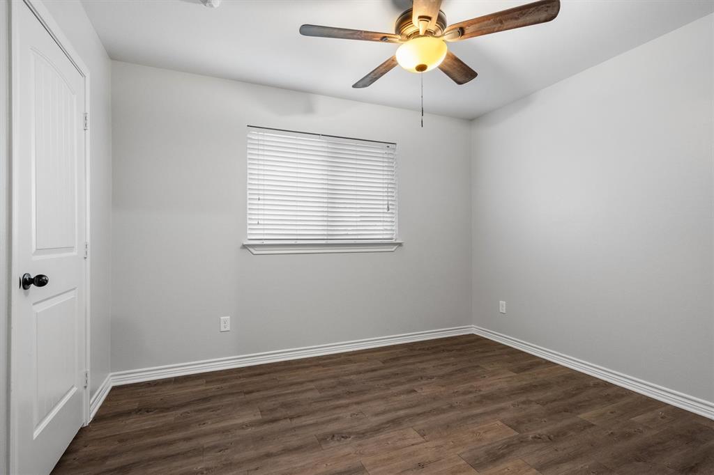 151 Birdsong Lane Terrell, TX 75160 - Photo 23 of 28 Versatile bedroom or office space with ceiling fan, neutral tones, and natural light.