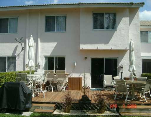 3151 Holiday Spring, Unit 4 Pompano Beach, FL 33063 - Photo 5 of 7 Patio/Deck