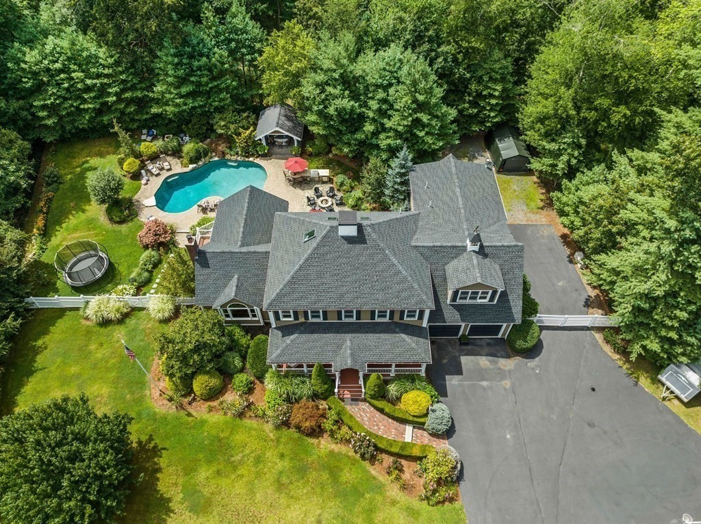 171 River Road Hanover, MA 02339 - Photo 4 of 39 an aerial view of a house with yard swimming pool and outdoor seating