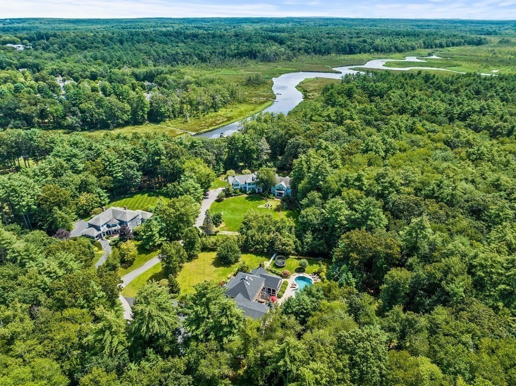 171 River Road Hanover, MA 02339 - Photo 5 of 39 a view of a garden with a lake view