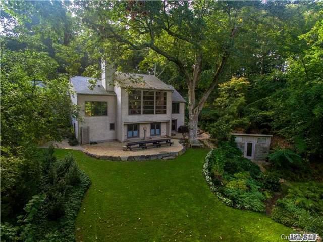 600 Moriches Road Nissequogue, NY 11780 - Photo 1 of 1 a view of a house with backyard sitting area and garden