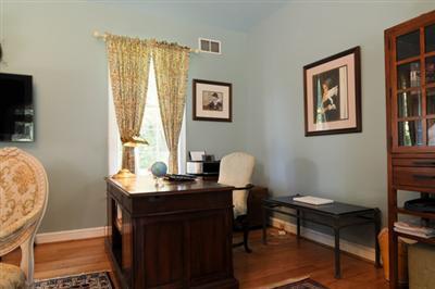 590 New Bedford Road Rochester, MA 02770 - Photo 12 of 20 a view of a workspace with furniture and a window