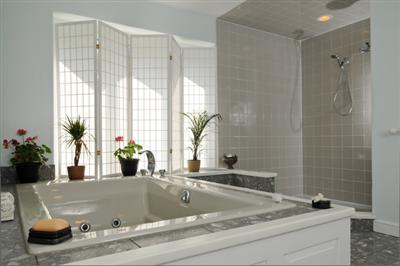 590 New Bedford Road Rochester, MA 02770 - Photo 16 of 20 a bathroom with a granite countertop tub and a sink