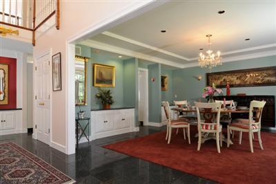 590 New Bedford Road Rochester, MA 02770 - Photo 5 of 20 a view of a dining room with furniture and chandelier