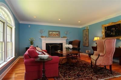 590 New Bedford Road Rochester, MA 02770 - Photo 7 of 20 a living room with furniture and a fireplace