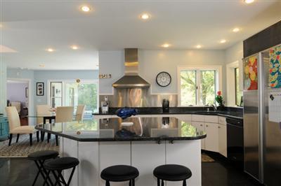 590 New Bedford Road Rochester, MA 02770 - Photo 9 of 20 a kitchen with stainless steel appliances granite countertop a sink and cabinets