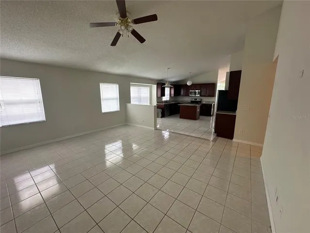 a kitchen with a refrigerator and a refrigerator