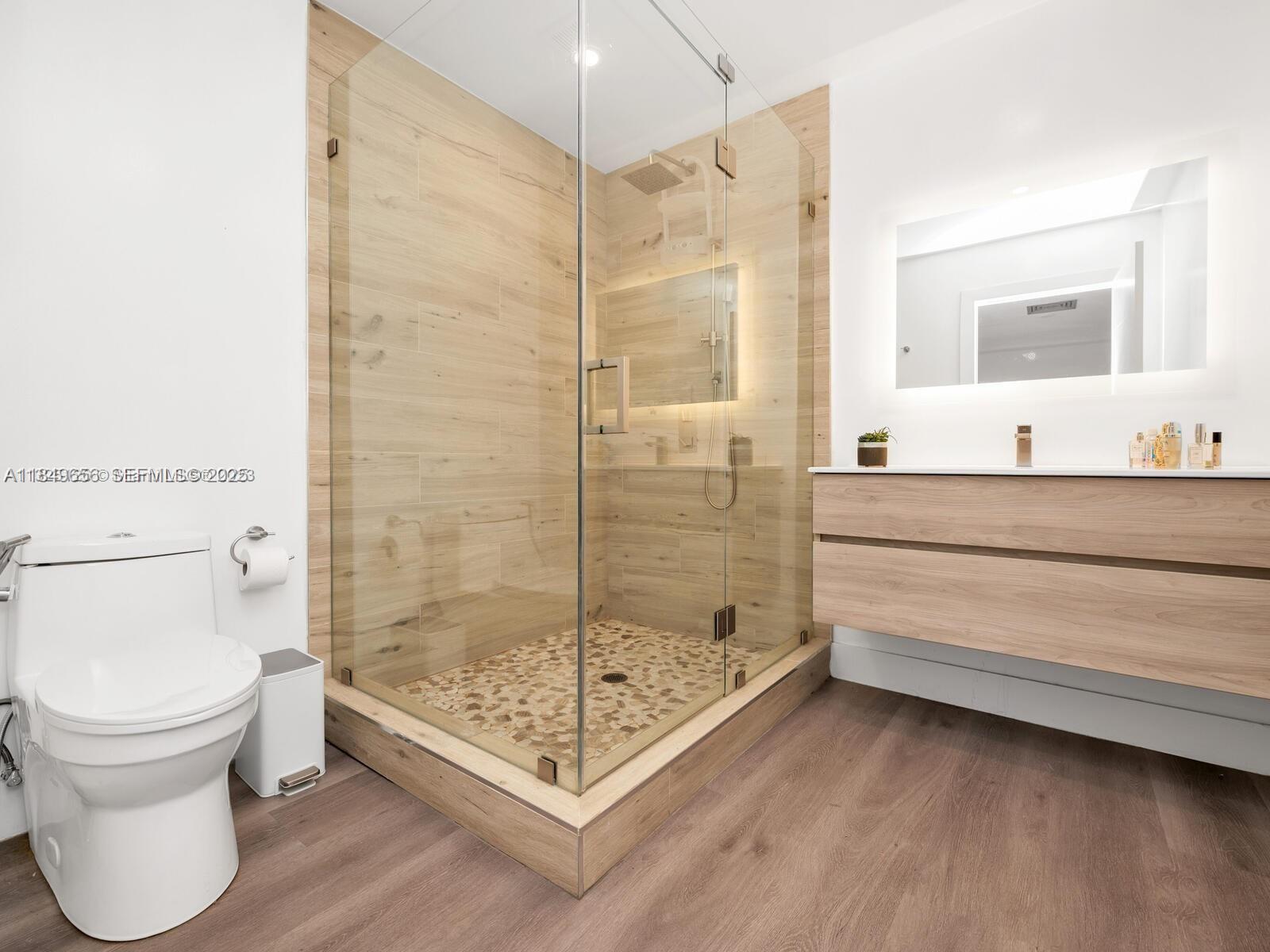 13350 Luray Road Southwest Ranches, FL 33330 - Photo 27 of 56 a bathroom with a sink toilet and shower