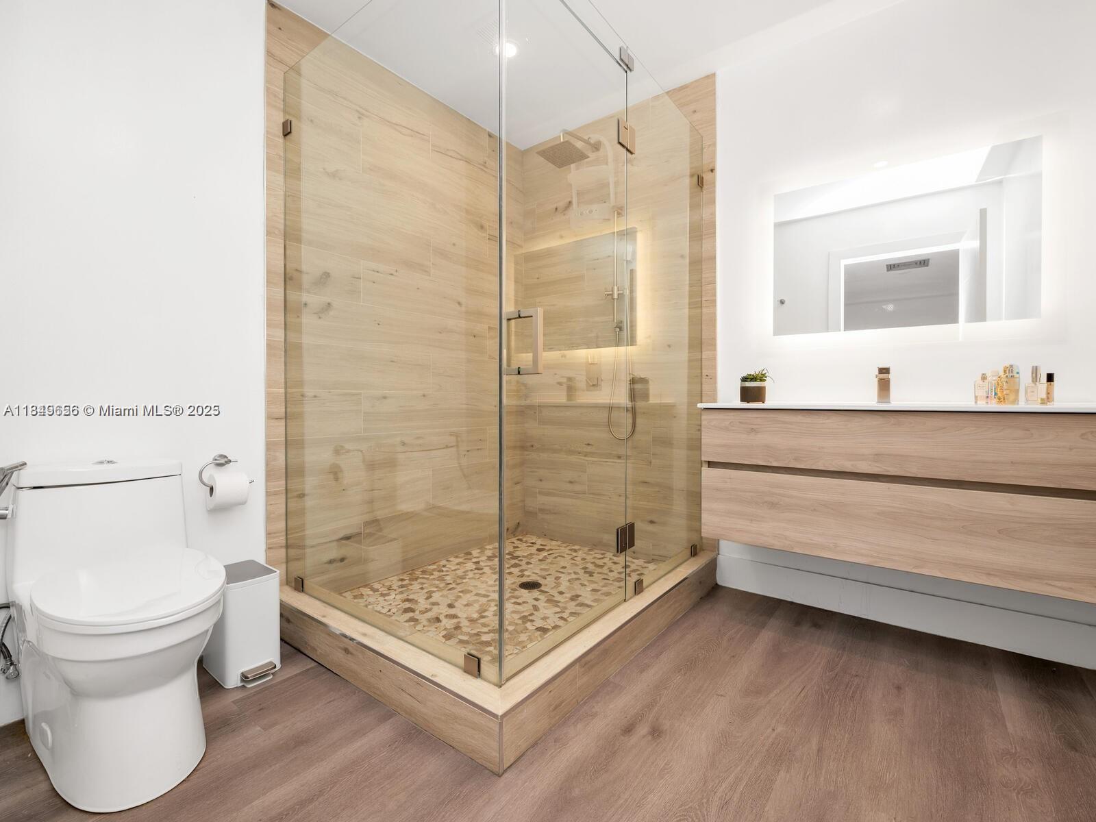 13350 Luray Road Southwest Ranches, FL 33330 - Photo 27 of 56 a bathroom with a sink toilet and shower