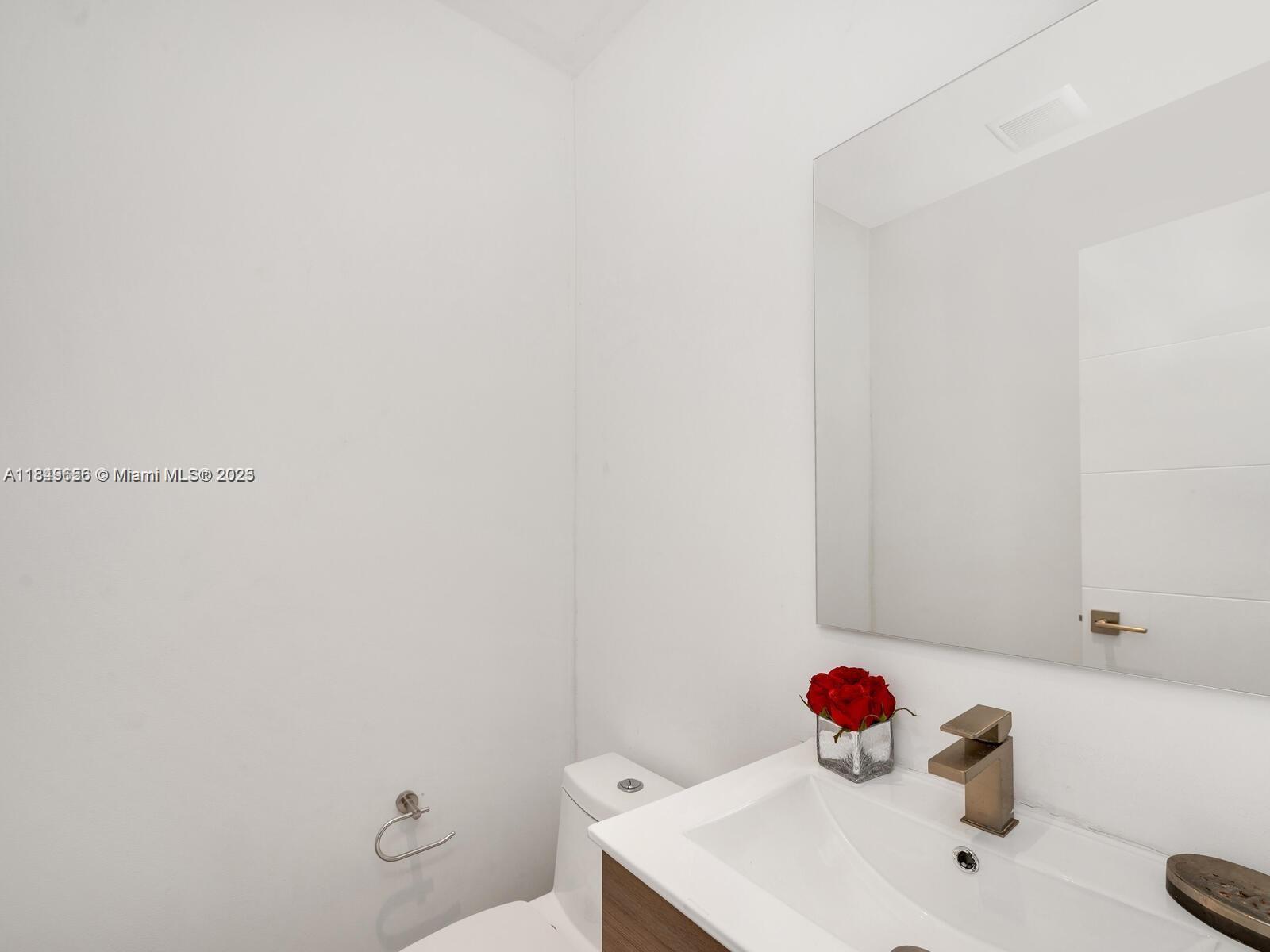 13350 Luray Road Southwest Ranches, FL 33330 - Photo 28 of 56 a bathroom with a sink and a toilet