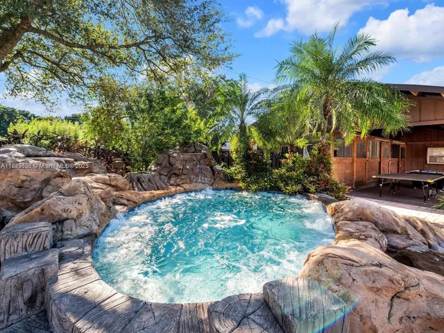 a view of a chairs and tables in the patio