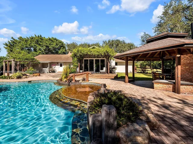 a outdoor space with patio lots of furniture