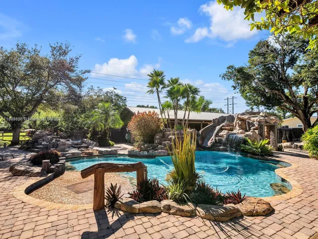 a view of a pathway with a patio