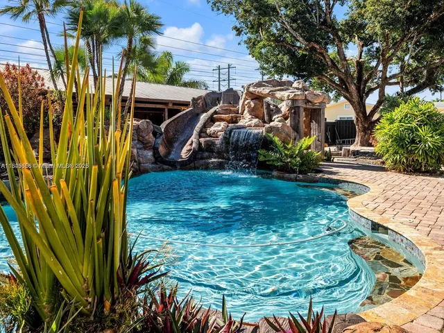 a view of a backyard with a patio