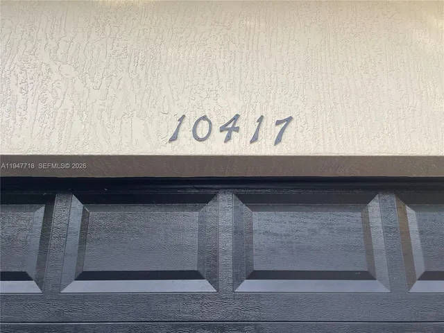 a view of a hallway with a window